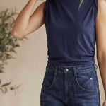 graced The Cinch Side Top in new navy cotton with a flattering side tie detail worn by a smiling blonde model