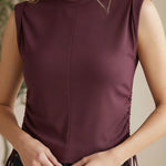 graced Cinch Side Top in winetasting ribbed cotton with side tie detail and sleeveless silhouette on a smiling model