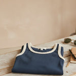 Navy blue ribbed tank top from Z Supply's The Clarke Ribbed Tank, featuring a fitted sleeveless design and ribbed fabric.