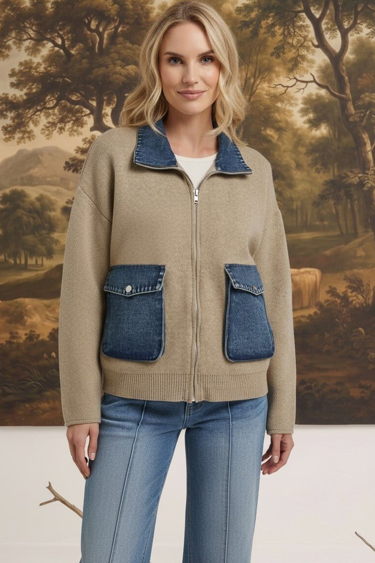 graced The Dolly zip-up sweater jacket in taupe with contrasting blue denim collar and pocket details on a model.