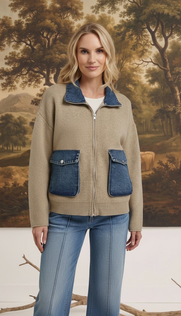 graced The Dolly zip-up sweater jacket in taupe with contrasting blue denim collar and pocket details on a model.