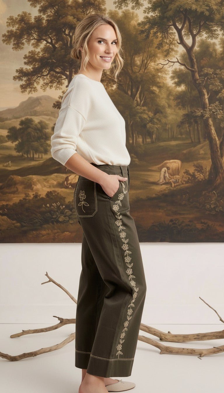 graced Eden wide leg pants in olive green cotton with delicate floral embroidery and a relaxed flowy silhouette