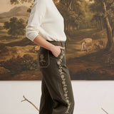graced Eden wide leg pants in olive green cotton with delicate floral embroidery and a relaxed flowy silhouette