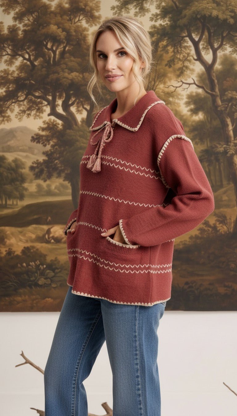 graced Jenna Whipstitch Sweater in dusty rose with contrast cream embroidery, collar, and front pockets on a model