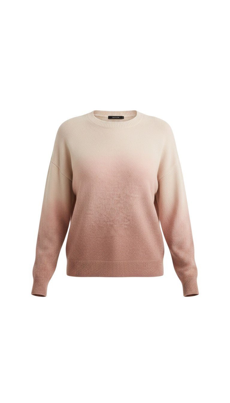graced The Joan Gradient Sweater in a soft beige to dusty rose ombre knit with a relaxed fit and crew neckline