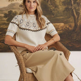 graced Josephine Faire Isle short-sleeve knit top in cream with brown and grey geometric patterns on a woman