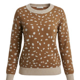 graced Kathy sweater in brown with a white deer pattern, featuring a crew neck and ribbed knit trim.