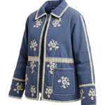 graced The Lea blue cotton jacket with white floral embroidery and lace trim details on a white background