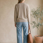 Taupe Graced Lyn Super Soft Batwing V-Neck Sweater displayed on a model, showcasing its relaxed fit and cozy fabric.
