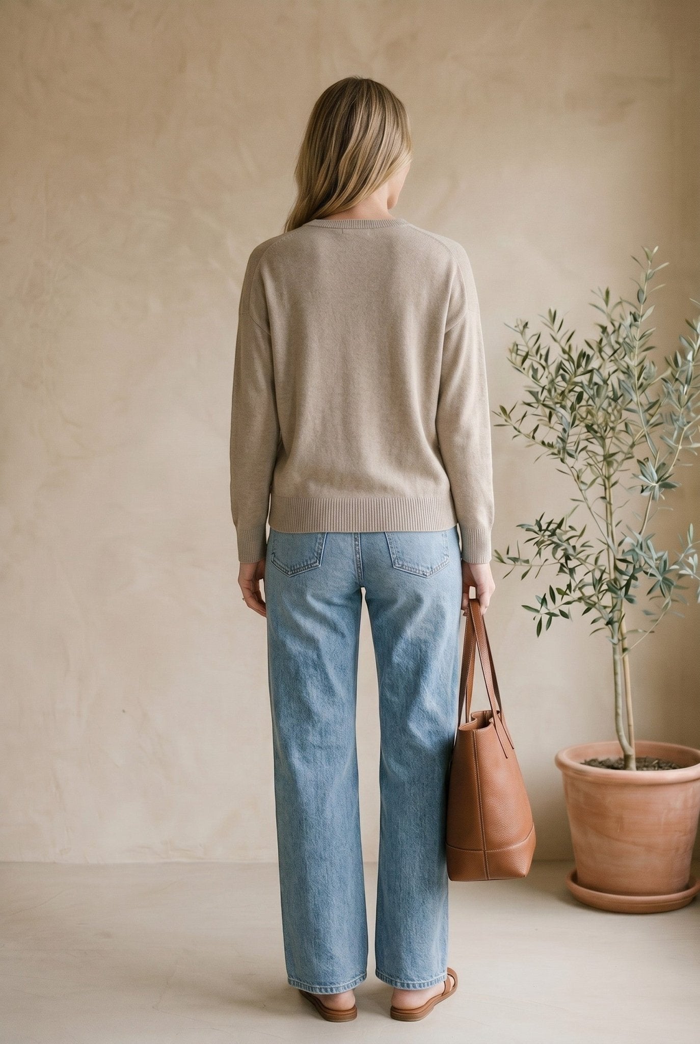 Taupe Graced Lyn Super Soft Batwing V-Neck Sweater displayed on a model, showcasing its relaxed fit and cozy fabric.