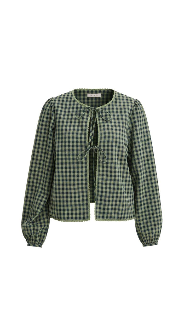 graced Madilynne Gingham Top in green and black with long sleeves, delicate lace trim, and front tie closures.
