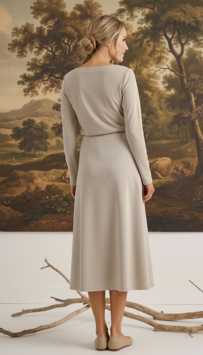 graced Margo midi skirt in beige wool blend worn by a woman with blonde hair in a bun, back view