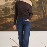 graced chocolate off the shoulder top with long sleeves worn by a blonde model with dark blue jeans