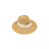 Beige straw hat with a white band on a white background