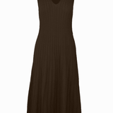 Graced Skyler Dress in soft pastel with flowy fabric, featuring a V-neckline and long sleeves, displayed on a mannequin.