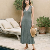 Elegant Skyler Dress by graced featuring a flowing design and stylish silhouette, showcased on a model against a neutral background.