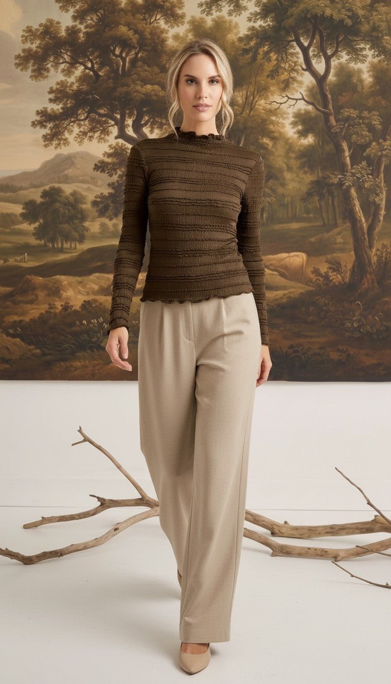 graced Tatum chocolate brown long-sleeve top with lettuce-edge neckline and sleeves worn by a blonde model