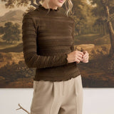graced The Tatum chocolate brown long-sleeve top with textured fabric and delicate lettuce-edge neckline and cuffs.