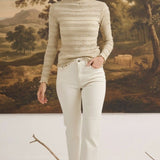 graced The Tatum Lettuce Edge Top in oatmeal featuring a textured mock neck and long sleeves with ruffled edges
