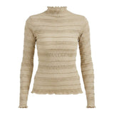 graced The Tatum oatmeal long sleeve top with lettuce edge detailing on the neckline, cuffs, and hem