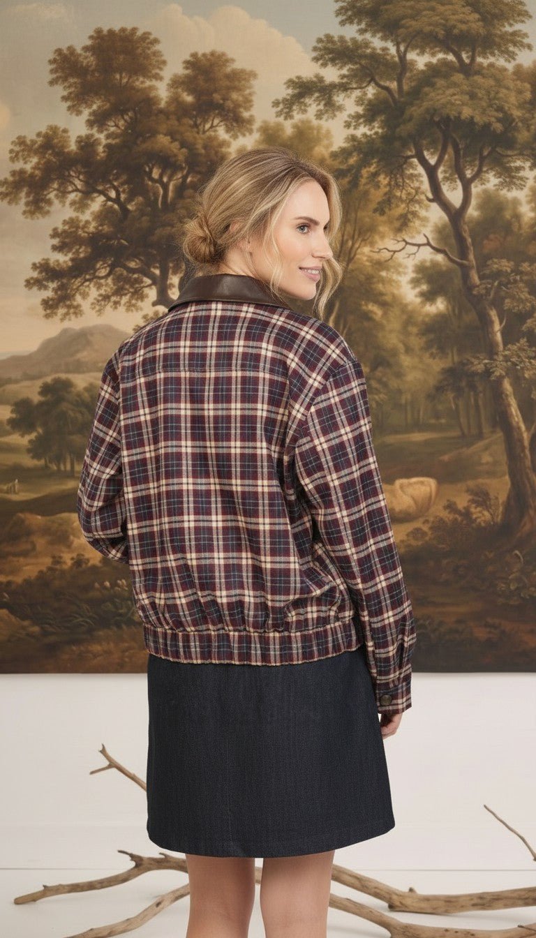 graced Tessa burgundy plaid bomber jacket with leather collar worn by a woman, back view