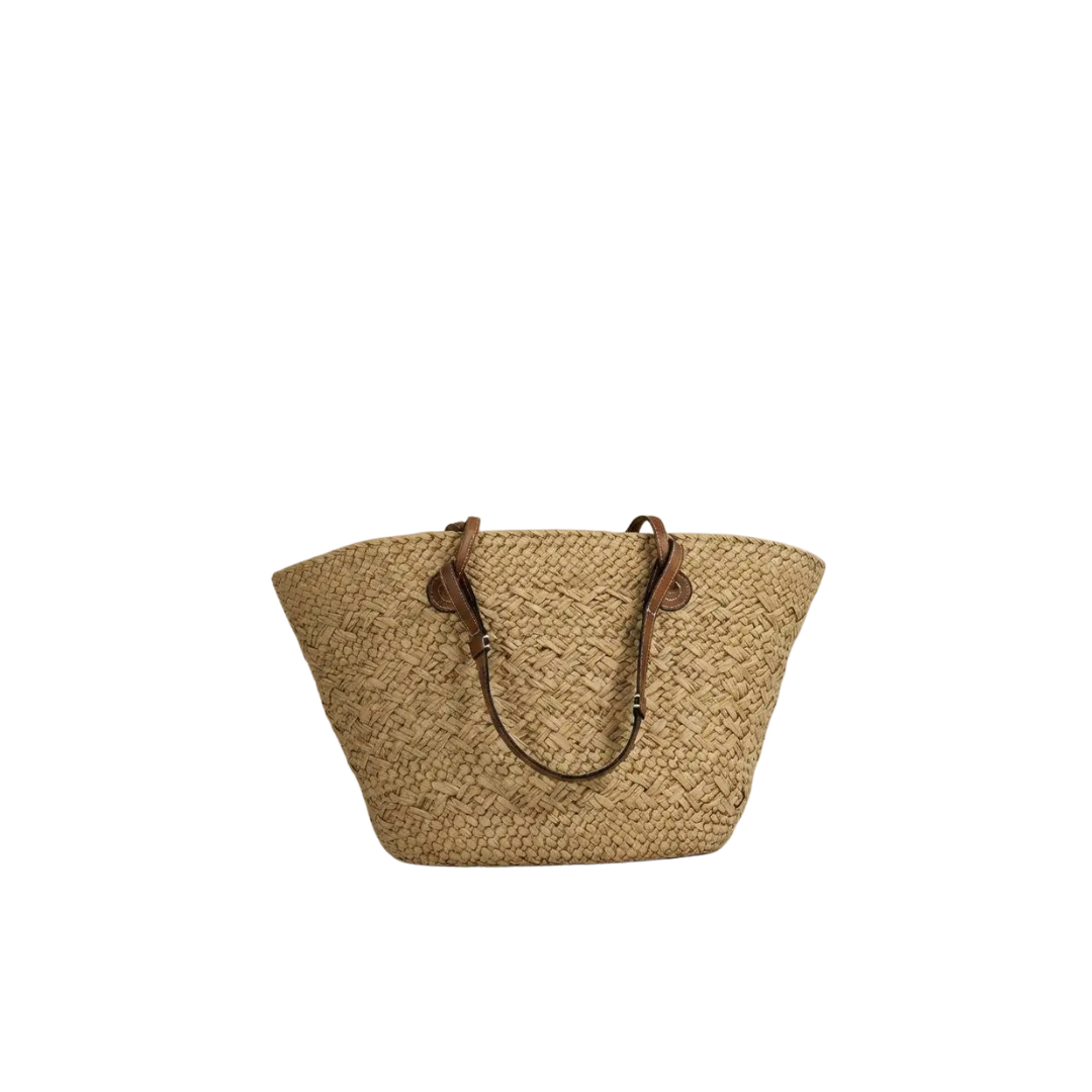 Tan woven straw market tote bag by Urban Daizy, featuring sturdy handles and spacious interior for everyday accessories.