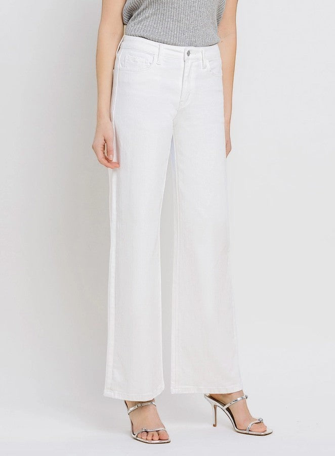 Vervet white high-rise wide-leg jeans displayed on a hanger, showcasing the relaxed fit and clean white denim fabric.