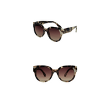 Marbled tortoise and bronze sunglasses from Z Supply The Lunch Date Accessories collection, showcasing stylish eyewear.